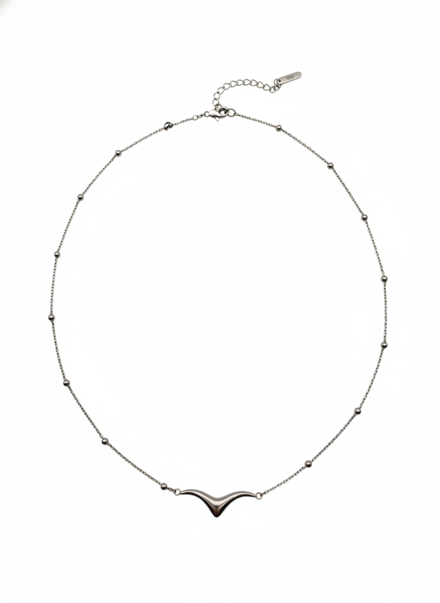 Necklace with a unique pendant on a white background