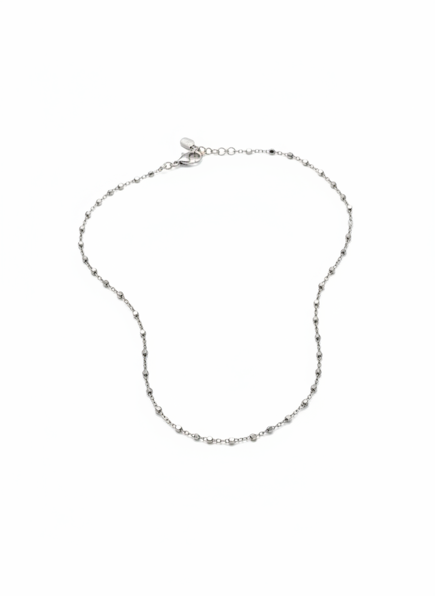 Silver chain necklace on a white background