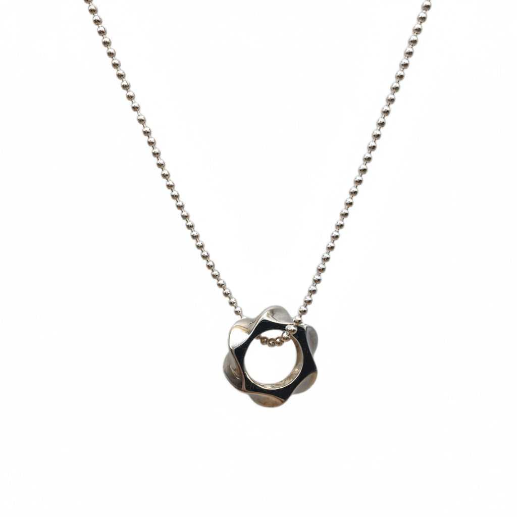 Necklace with a unique pendant on a white background