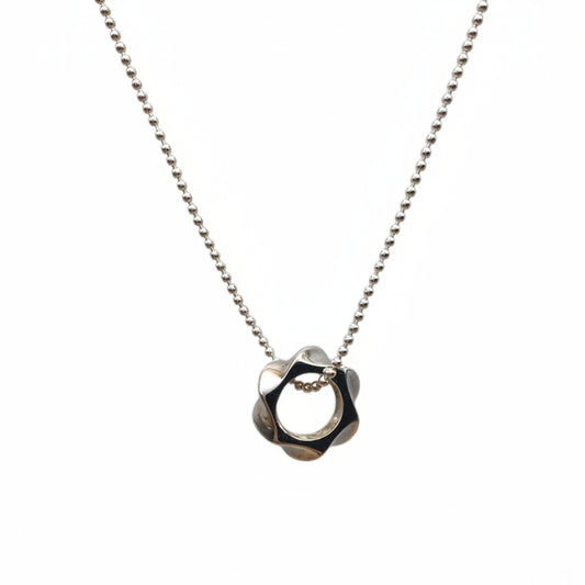 Necklace with a unique pendant on a white background