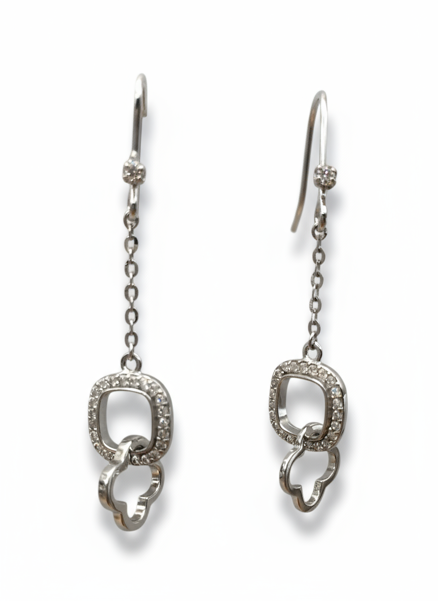 Pair of silver earrings with chain details on a white background