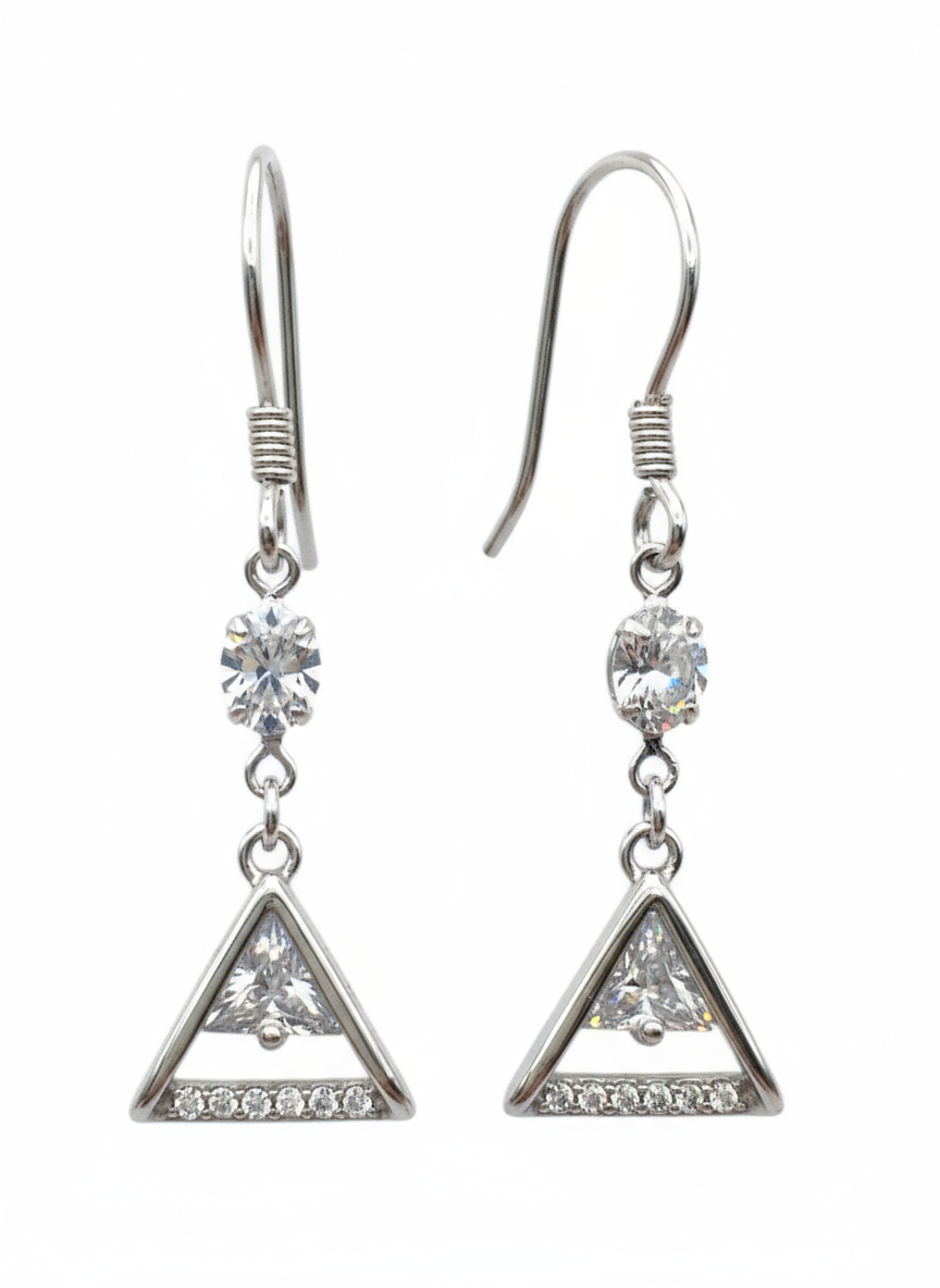 Pair of silver triangle earrings with clear gemstones on a white background
