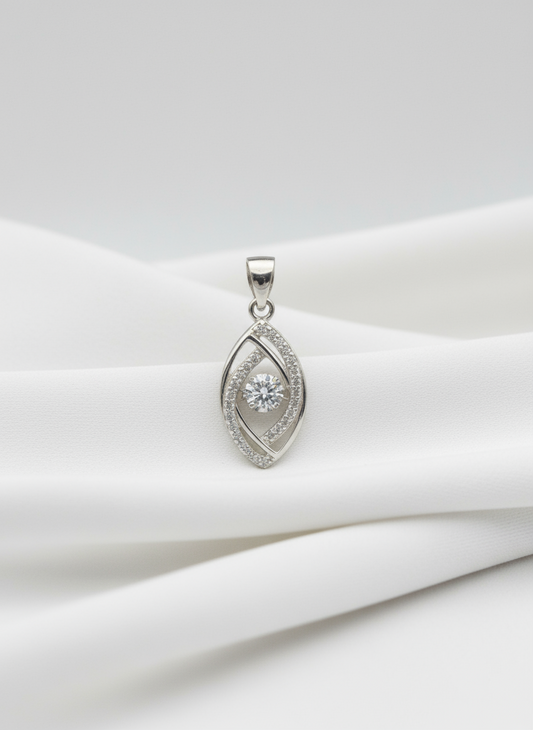 Silver pendant with a central gemstone on a white background