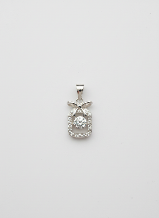Silver pendant with diamonds on a white background