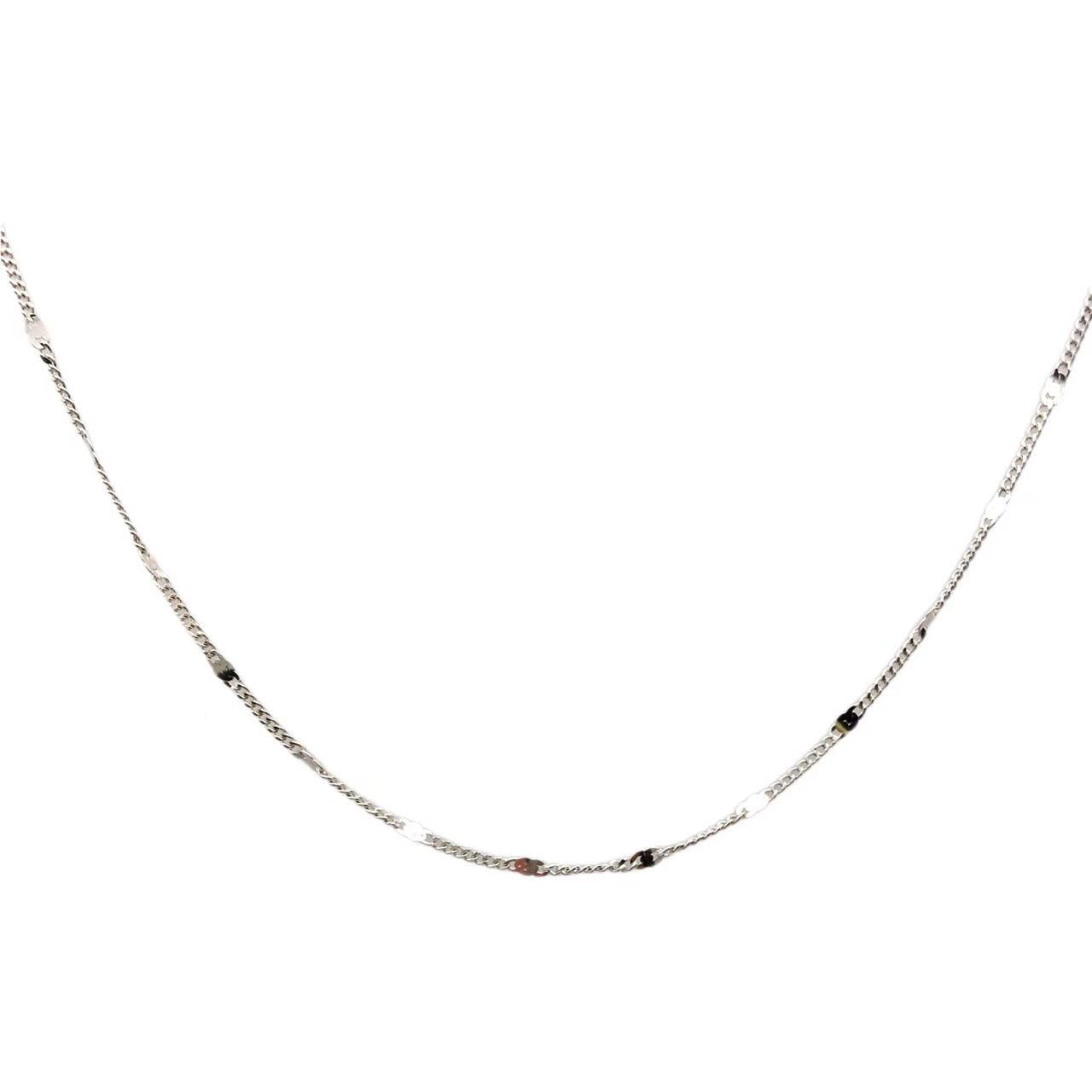 Silver chain necklace on a white background