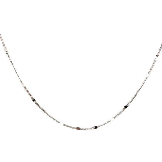 Silver chain necklace on a white background