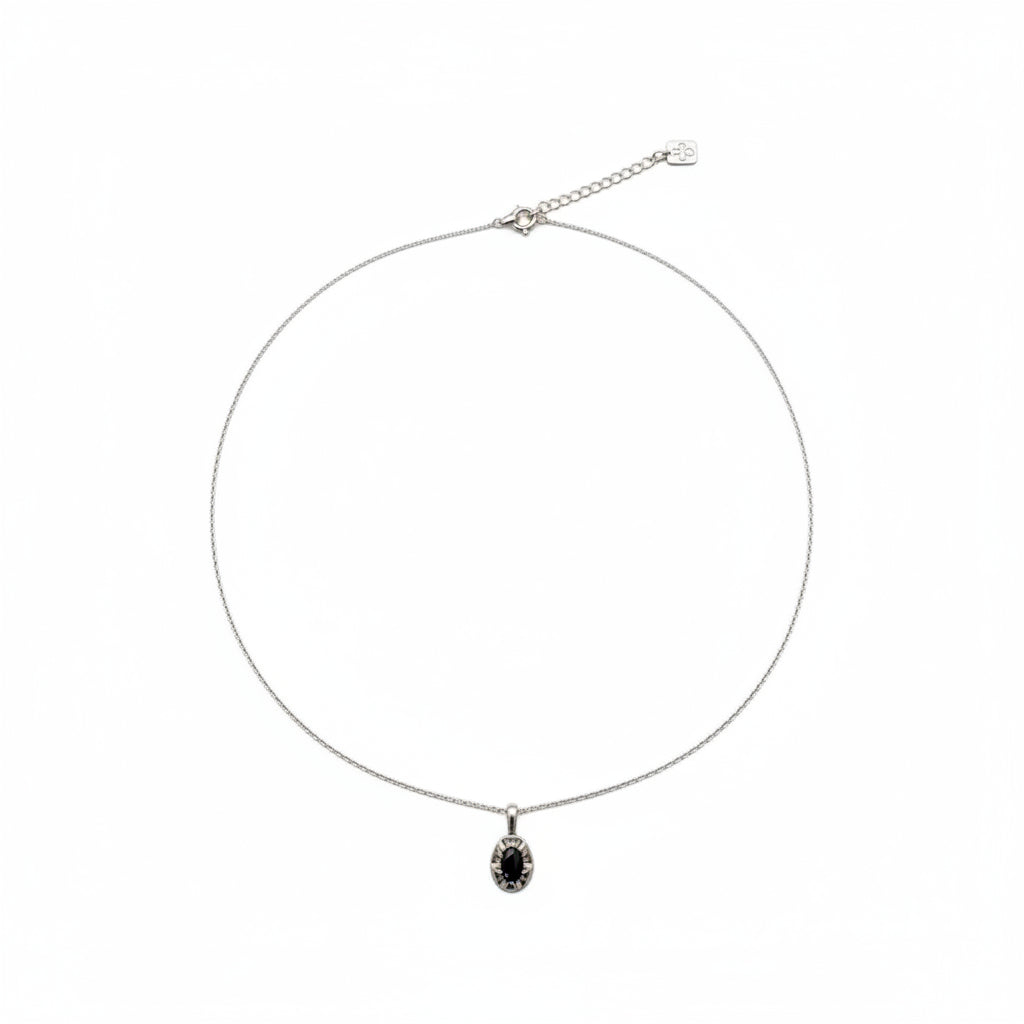 Necklace with a pendant on a white background
