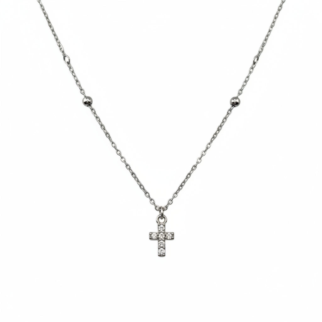 Necklace with a cross pendant on a white background