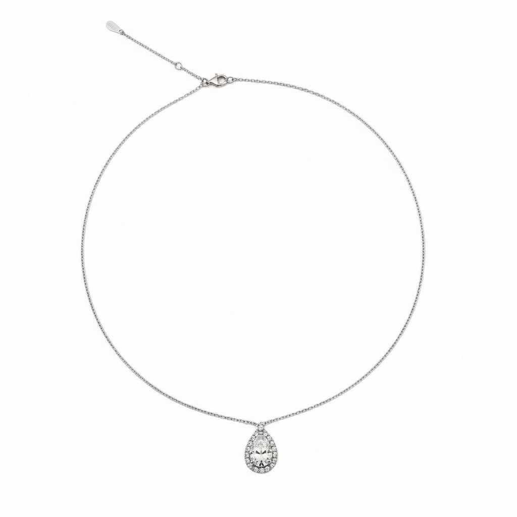 Delicate necklace with a teardrop-shaped pendant on a white background