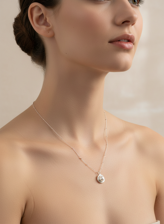 Necklace with a pendant on a white background