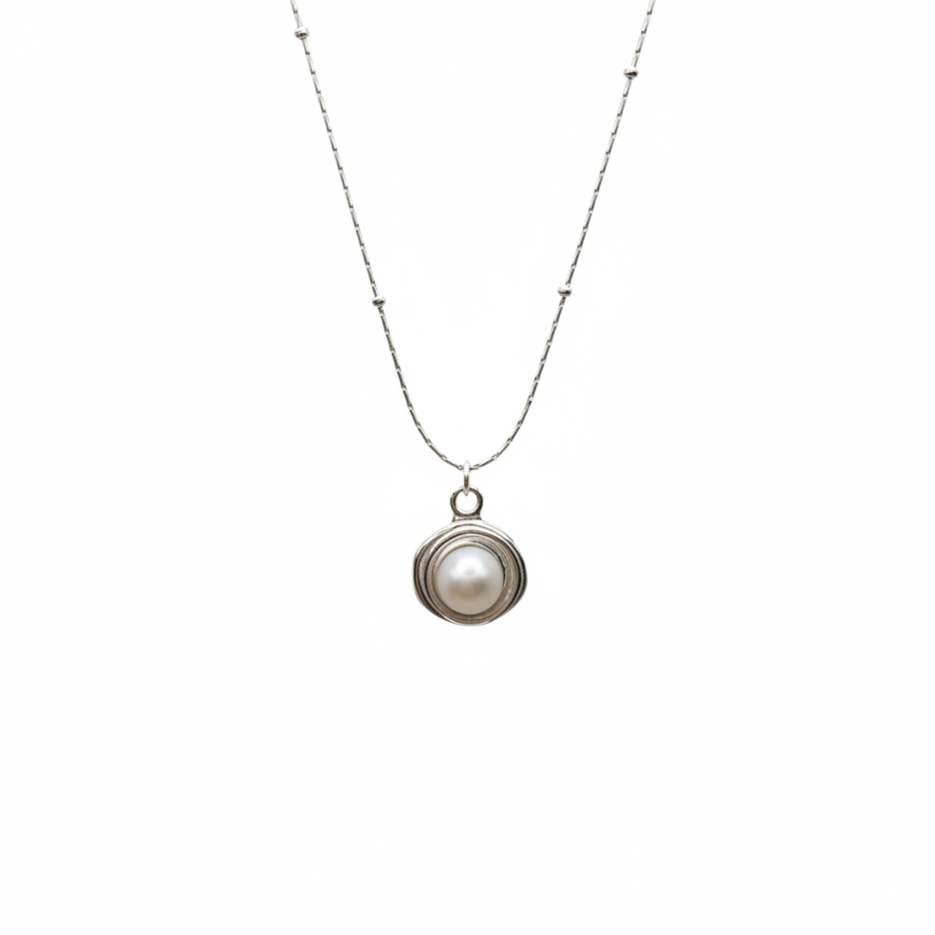 Necklace with a pearl pendant on a white background