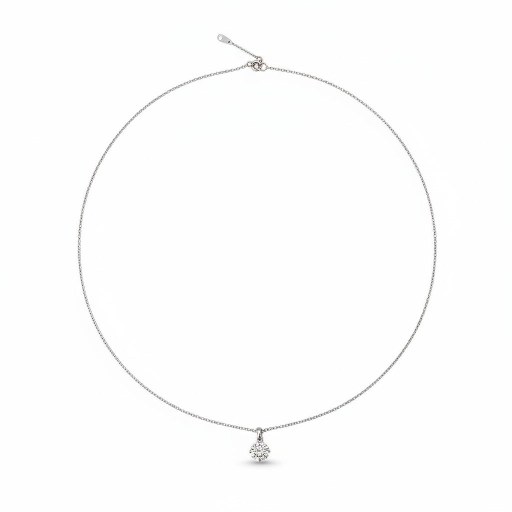 Delicate silver necklace on a white background