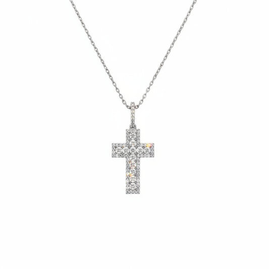 Silver cross necklace on a white background