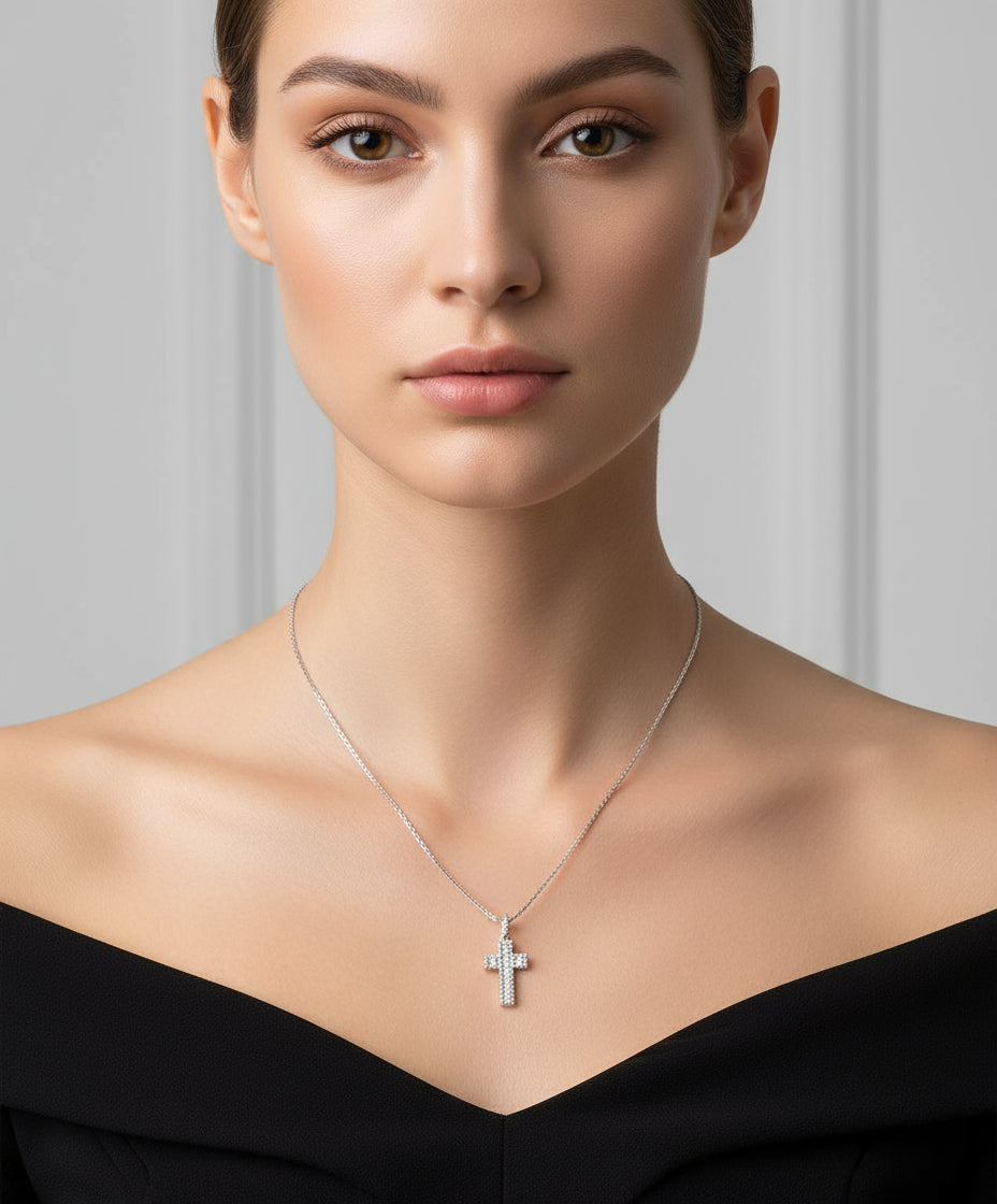 Necklace with a cross pendant on a white background