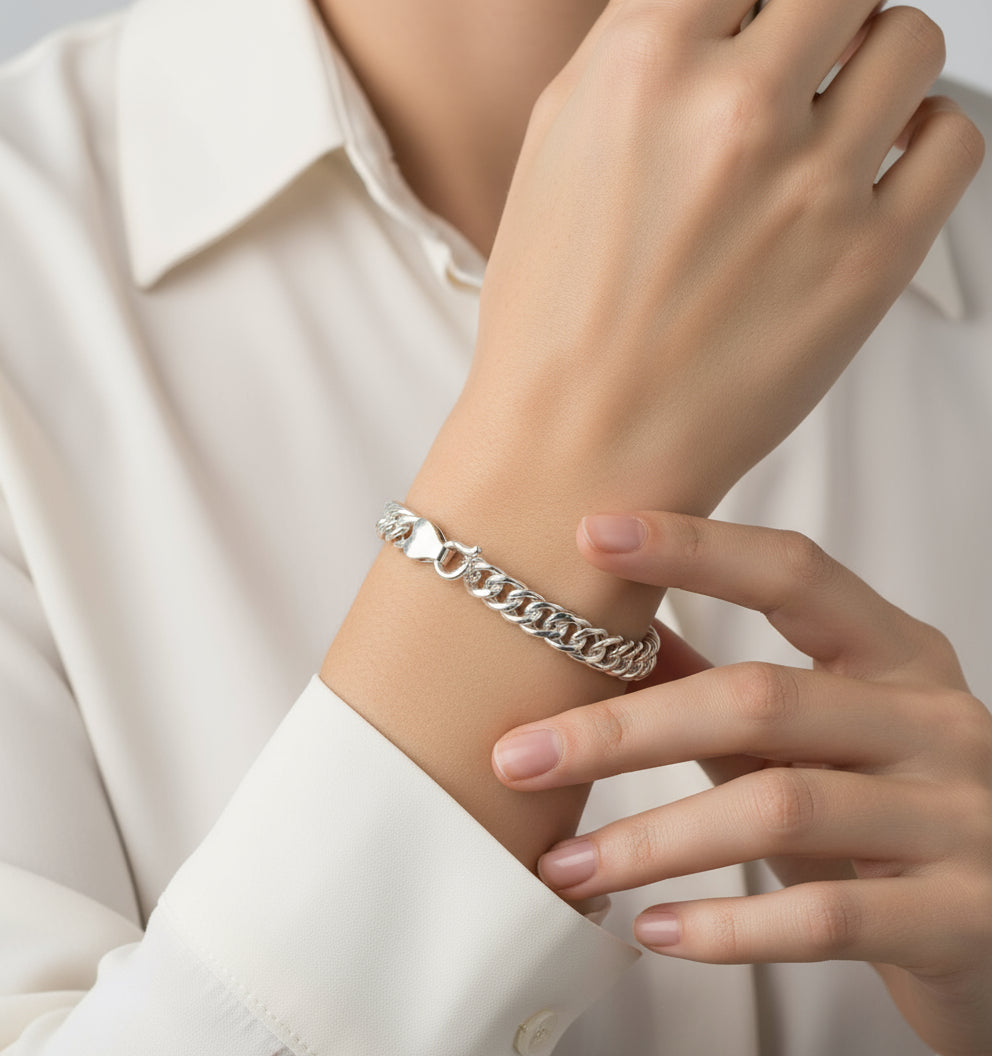 Silver chain bracelet on a white background