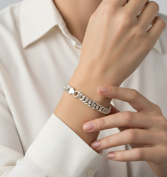 Silver chain bracelet on a white background