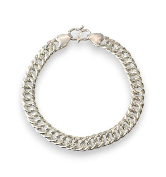 Silver chain bracelet on a white background