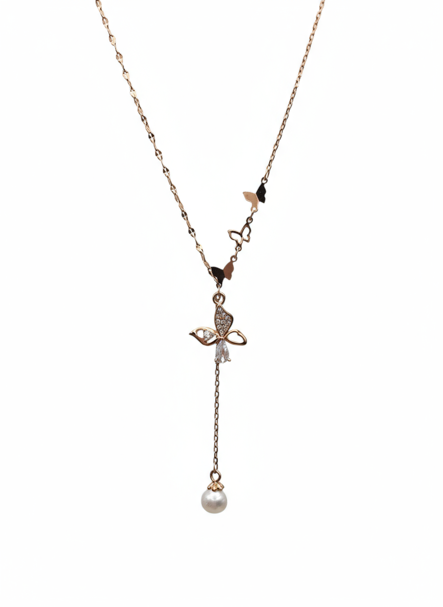 Delicate necklace with a small pendant and pearl drop on a white background