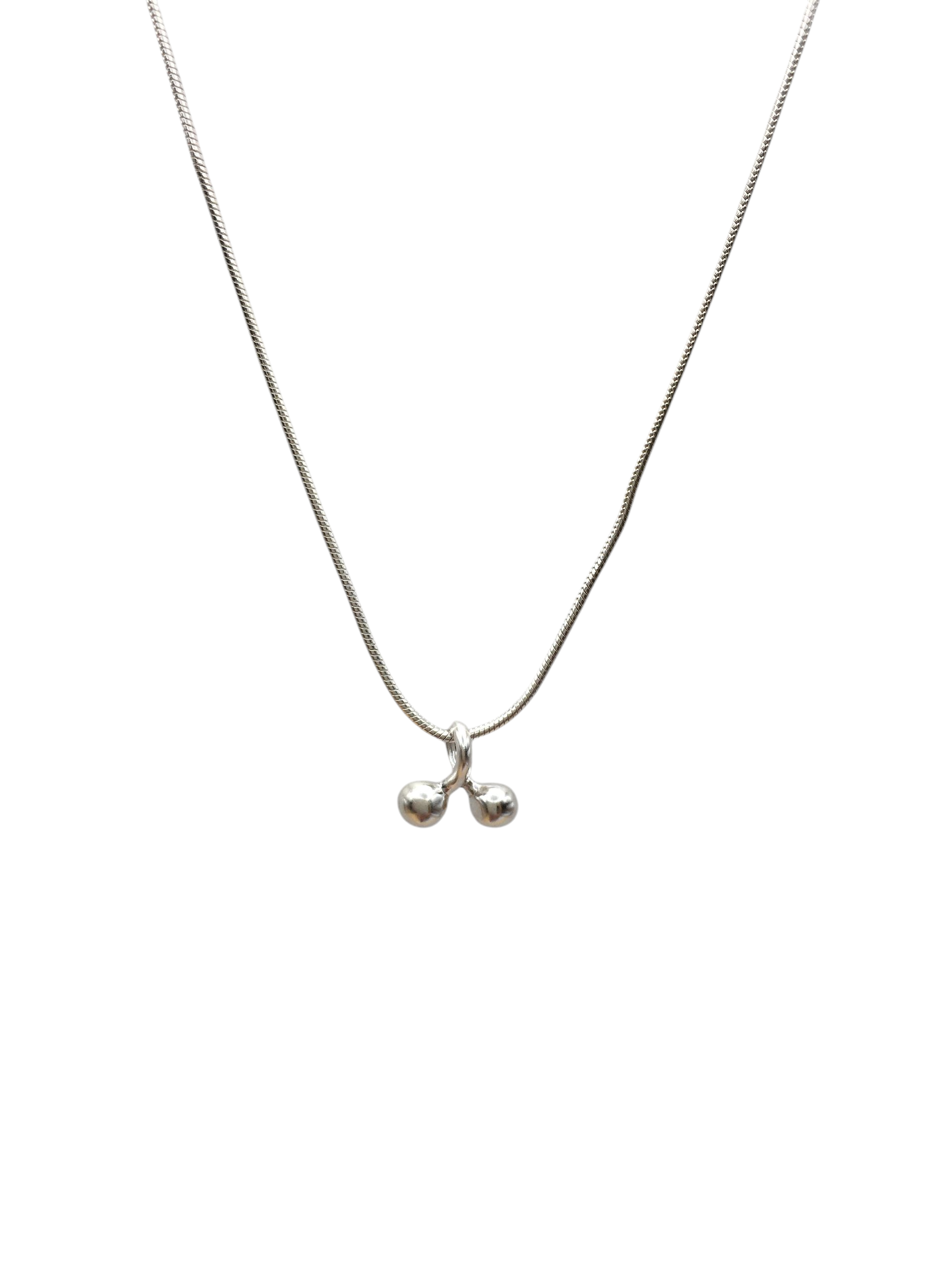 Silver necklace with a small pendant on a white background