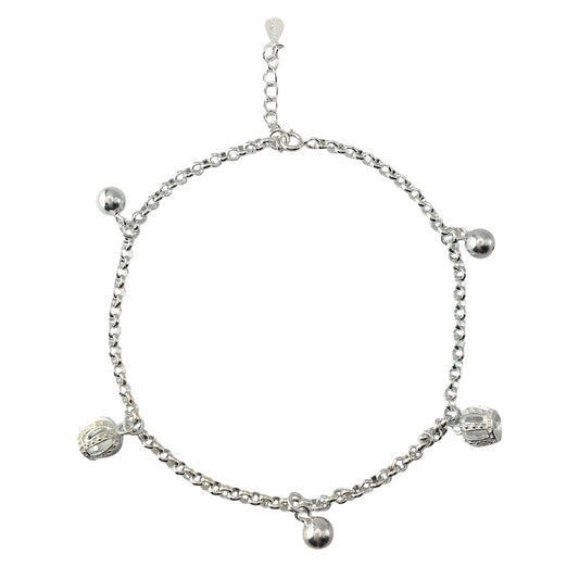 Silver bracelet with charms on a white background