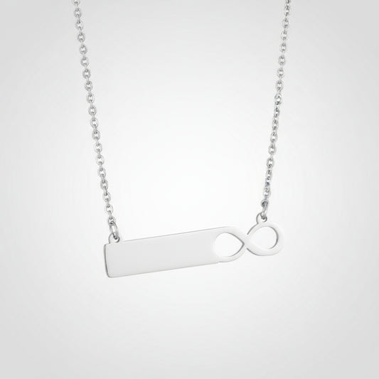 Silver necklace with a unique pendant design on a white background