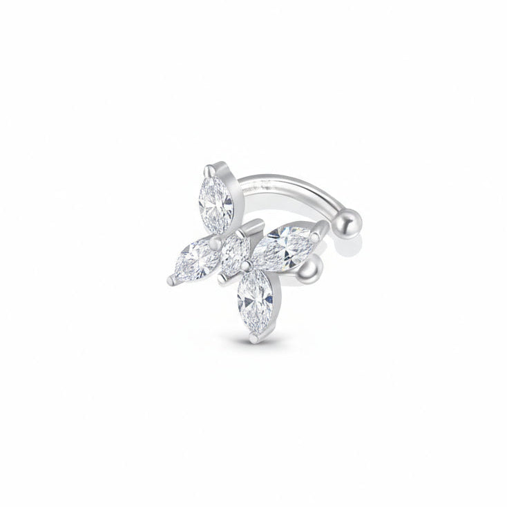 Silver nose ring with clear gemstones on a white background