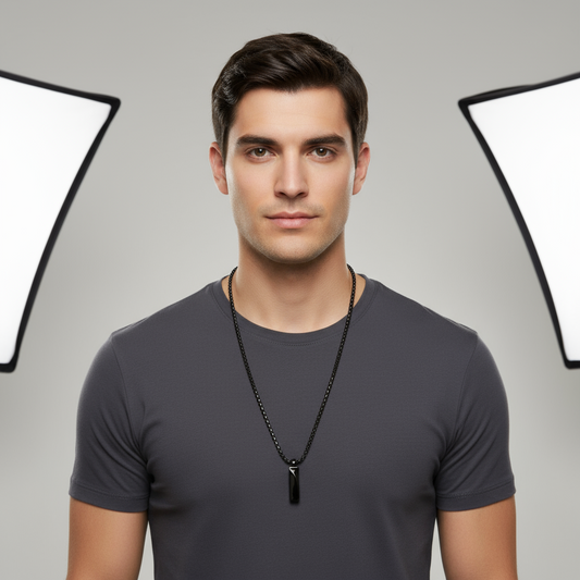 Black chain necklace with a pendant on a white background