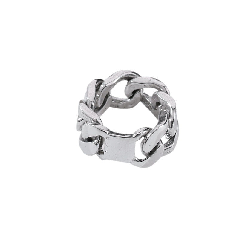 Silver chain-style ring on a white background