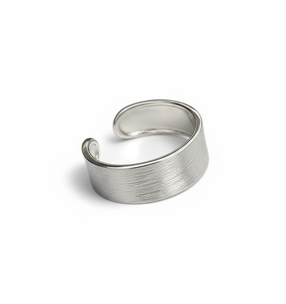 Silver open ring on a white background