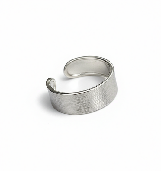 Silver open ring on a white background