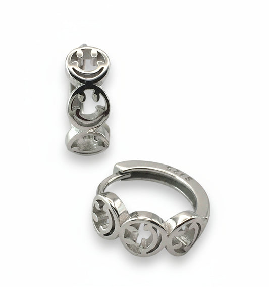 Silver hoop earrings with star symbol design on a white background
