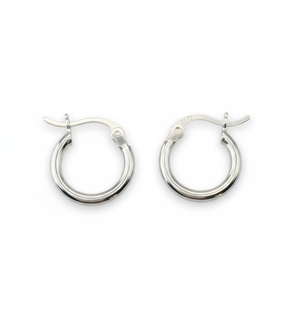 Pair of silver hoop earrings on a white background