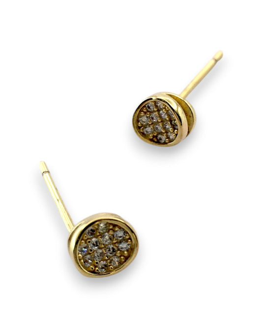 Gold earrings with embedded stones on a white background