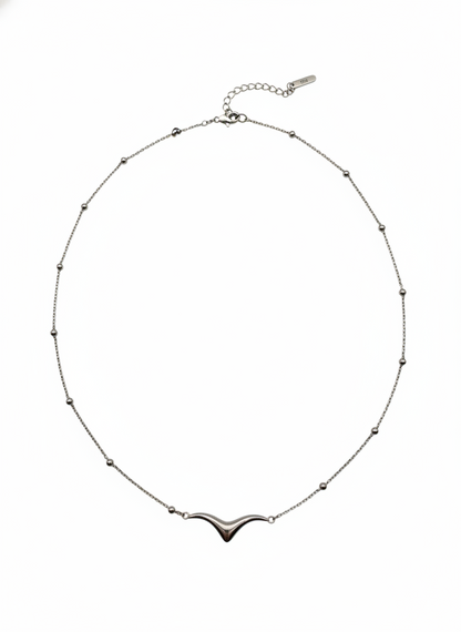 Necklace with a unique pendant on a white background