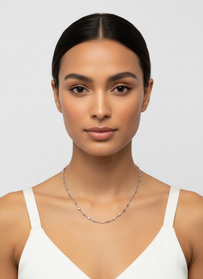 Silver chain necklace on a white background