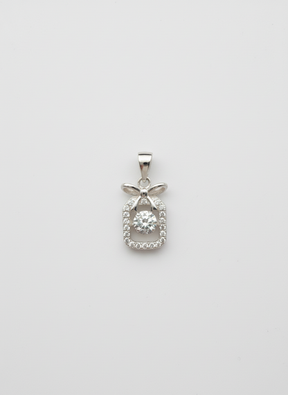Silver pendant with diamonds on a white background