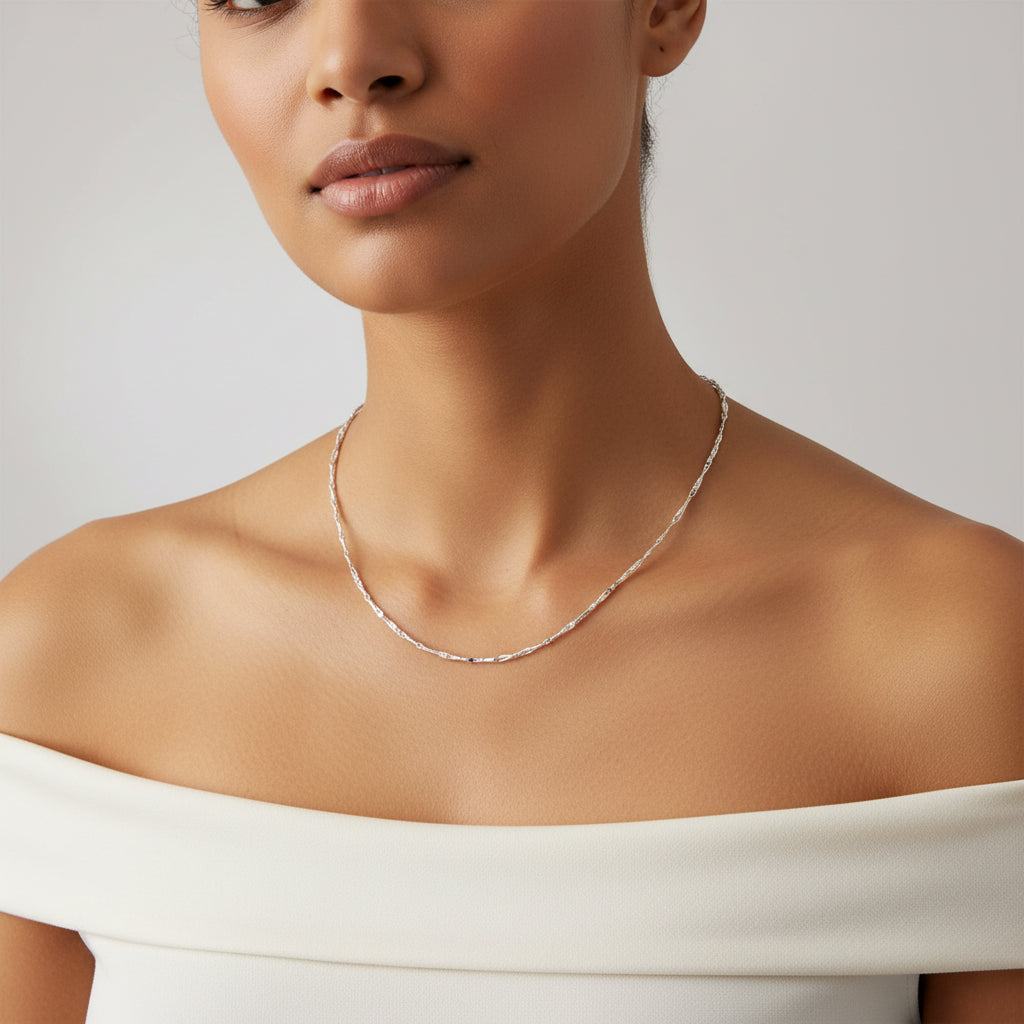 Silver necklace on a white background