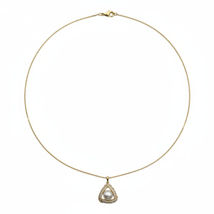 Gold necklace with a teardrop-shaped pendant on a white background