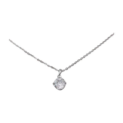 Silver necklace with a round pendant on a white background
