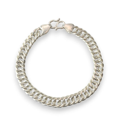 Silver chain bracelet on a white background