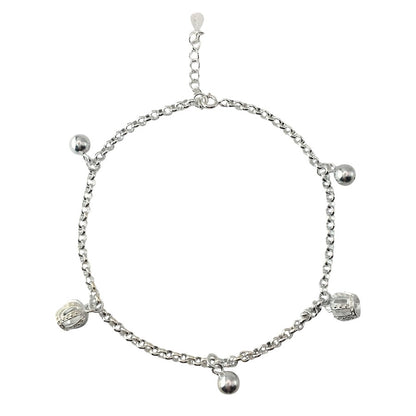 Silver bracelet with charms on a white background