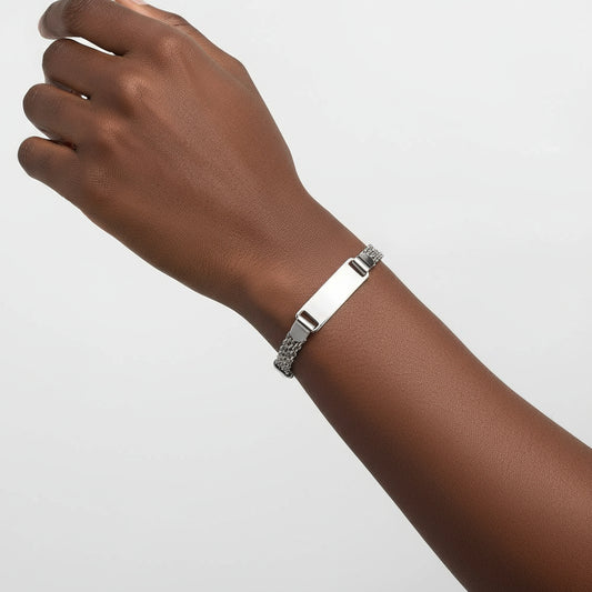 Silver bracelet with a chain design on a white background