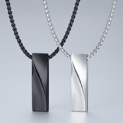 Two necklaces with black and silver pendants on a white background