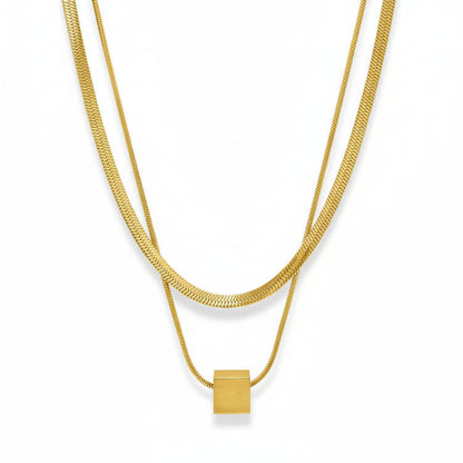 Two silver necklaces with square pendants on a white background