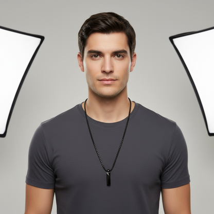 Black chain necklace with a pendant on a white background