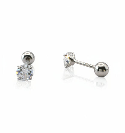 Pair of silver stud earrings with clear gemstones on a white background